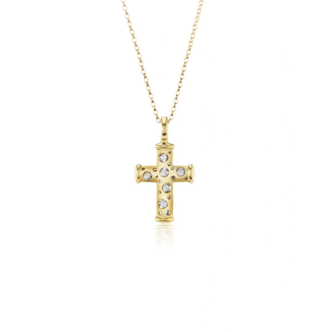 A gold cross with diamonds on it's side.