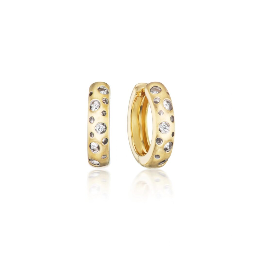 A pair of gold earrings with diamonds on them.