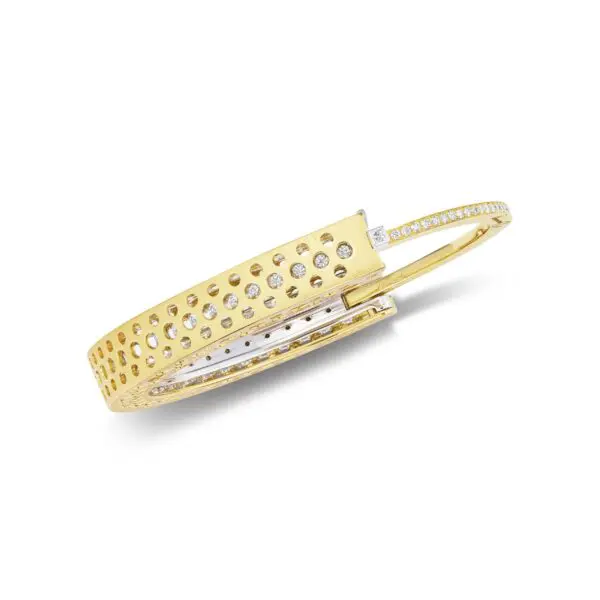 A gold tie clip with diamonds on top of it.