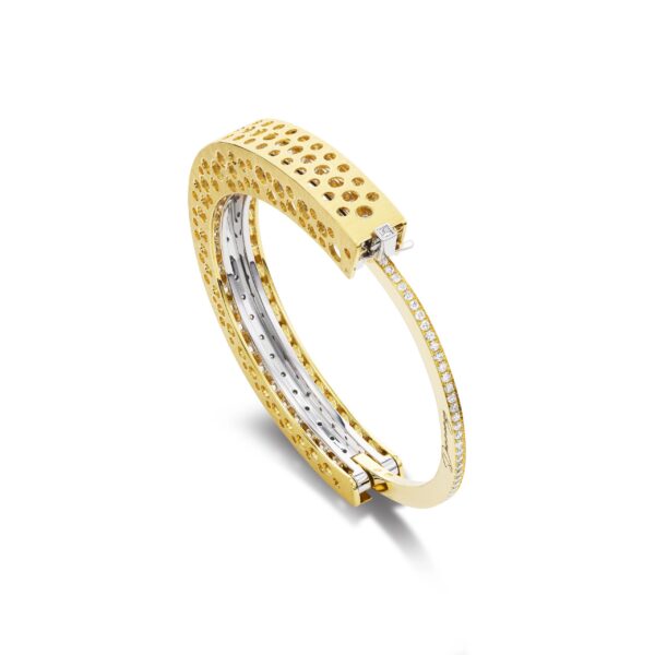 A gold and diamond bracelet with two rows of diamonds.