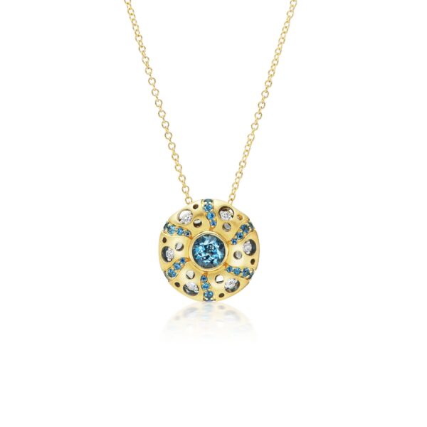 A gold necklace with blue and white stones.