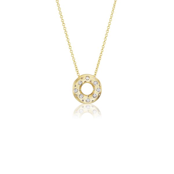 A gold necklace with a circle of diamonds on it.