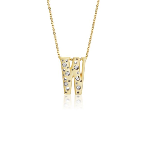 A gold necklace with two letters and diamonds.