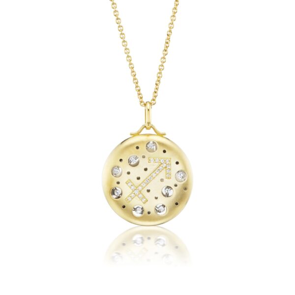 A gold necklace with a clock on it