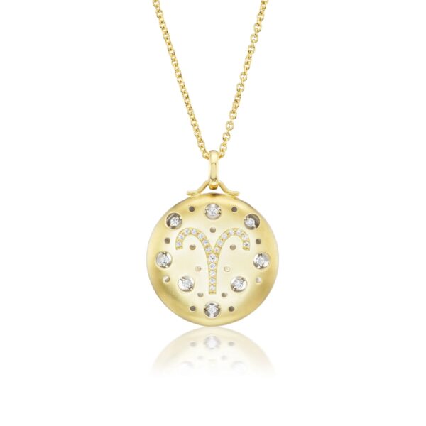 A gold necklace with a clock on it