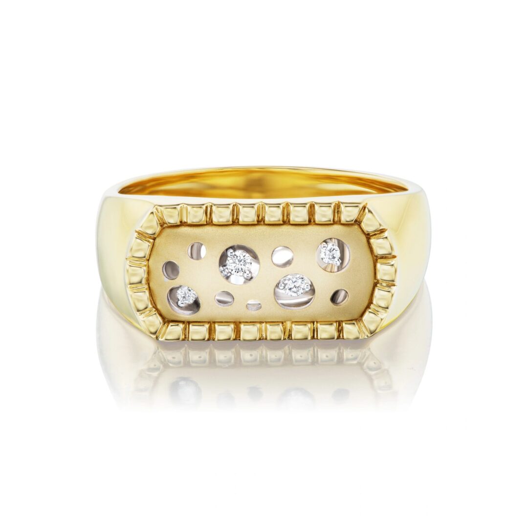 A gold ring with some white stones on it