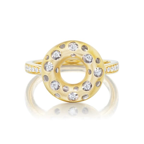A yellow gold ring with diamonds on top of it.