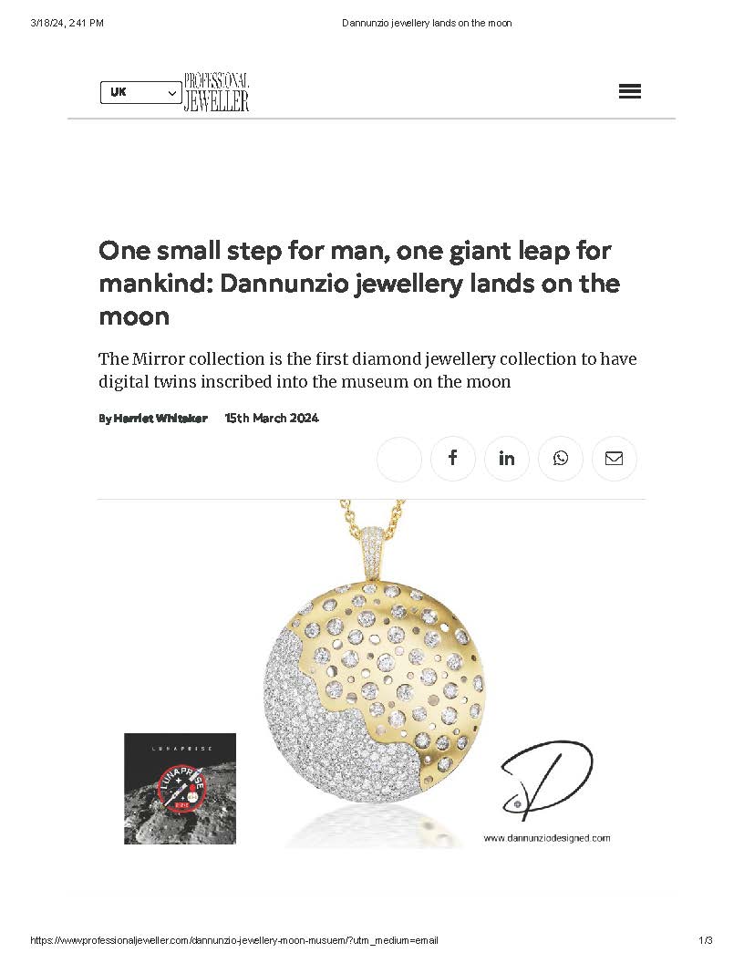 A gold and silver pendant is shown on the page of an article.