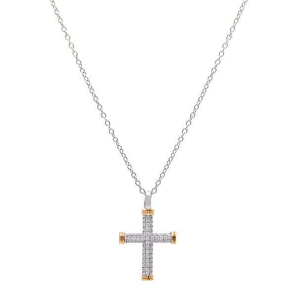 Diamond cross pendant on a silver chain.