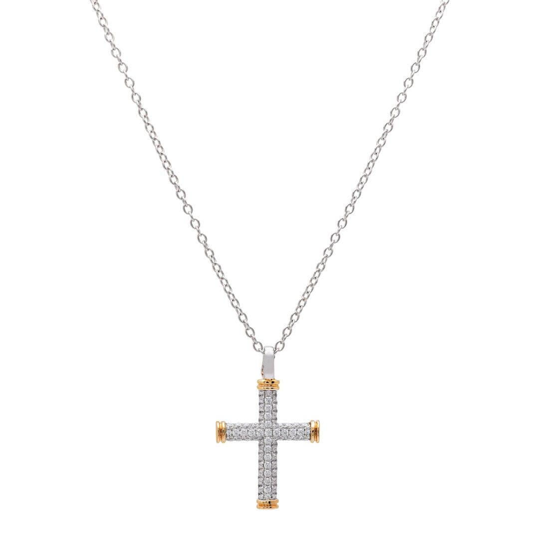 Diamond cross pendant on a silver chain.
