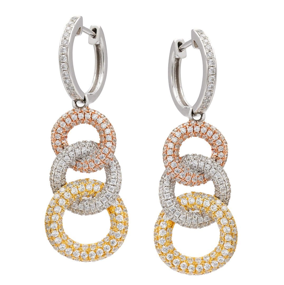 Diamond hoop earrings with three rings.