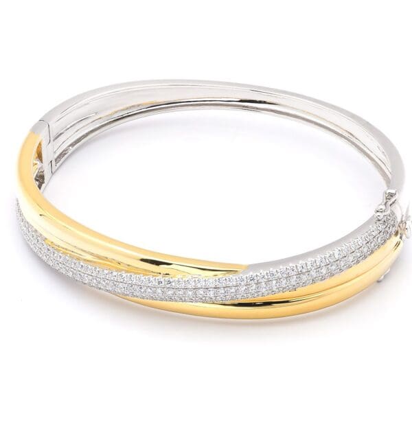 Gold and silver bangle with diamonds.