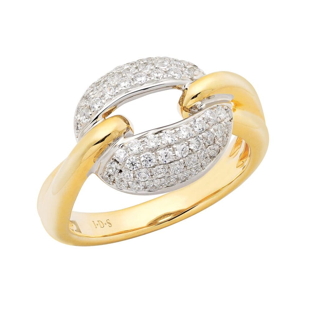 Diamond and gold ring with a unique design.