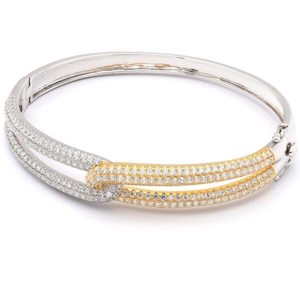 Diamond bangle with two-tone finish.