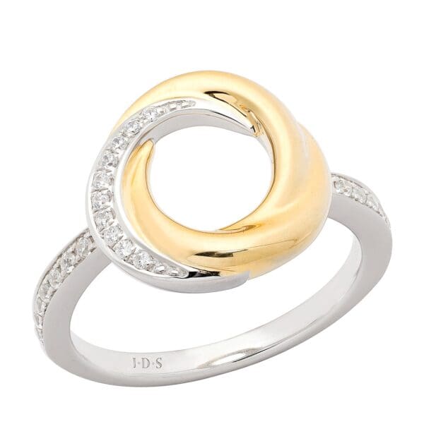 Two-tone ring with diamond accents.